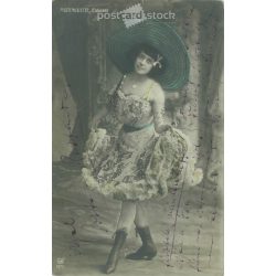   1909 - Mistinguett, French actress and singer. At one time she was the highest paid female entertainer in the world. Colored photo sheet, postcard. (2791540)