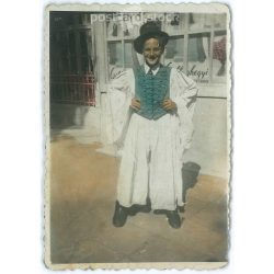   Young boy in traditional costume in front of the Csillaghegy Bath. Color paper image. (2791832)