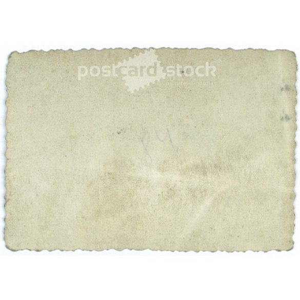 Young boy in traditional costume in front of the Csillaghegy Bath. Color paper image. (2791832)