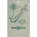 Portrait portrait of a young middle-class man in an elegant bow tie from the photo studio of Czernil R. Esztergom. Cabinet photo / hardback photo / business card. (2791872)