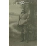 1915 - K.u.K. soldier in winter uniform with wand, full length, studio shot. Postcard, photo sheet. (2791892)