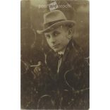 Elegant wealthy young man in hat with cigarette. Studio shot, photo sheet. 1920s, 1930s. (2791903)
