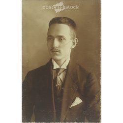   1916 - Young man in elegant attire. Studio shot. Original paper image. Postcard, photo sheet. (2791908)