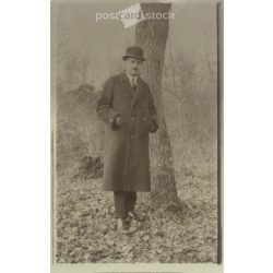   Photo of a full-length man from the 1920s in a hat and winter coat. Original paper image. Postcard, photo sheet. (2791909)