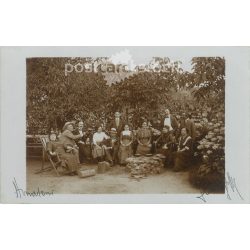   Group of friends gardening in the 1910s. Original paper image. Postcard, photo sheet. (2791924)