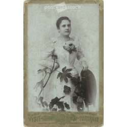   The work of painter and photographer Hawel Agoston, 1910s, Losoncz. Studio photo of young lady. Exciting composition combined with live flowers.  Cabinet card / CDV photo / hardback photo. (2791942)