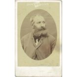 Studio portrait of a middle-aged, middle-aged man with a marked mustache and beard.  Cabinet card / CDV photo / hardback photo. (2791954)