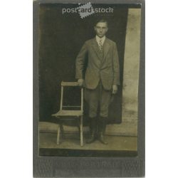   Full-length studio photo of a young man in a lower class.  Cabinet card / CDV photo / hardback photo. (2791955)