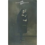 Full length photo of young girl with black kitten in studio. Original paper image. Postcard, photo sheet. (2791981)