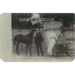   circa 1905 - Young woman with her father with a young foal going to the fair. Original paper image. Postcard, photo sheet. (2791995)
