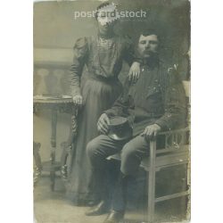   circa 1910 – Soldier on leave with his wife, studio, full-length shot. Original paper image. Cabinet photo / hardback photo / business card, CDV photo. (2792001)
