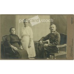   circa 1910 – Full-length family shot in the photography studio of Kozmann et al. Debrecen. Cabinet photo / hardback photo / business card, CDV photo. (2792002)
