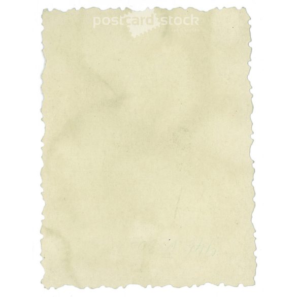 Young woman on the bank of the Danube after the liberation, with the bombed-out Buda Castle in the background. Original small paper image. (2792015)