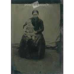   Young woman with her baby in elegant attire both of them. Original tintype. (2792025)