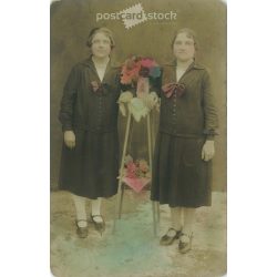   1Full-length studio photo of a pair of twins. Original paper image. Colored photo sheet, postcard. 1910s. (2792042)