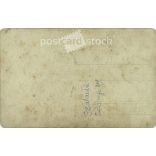 1Full-length studio photo of a pair of twins. Original paper image. Colored photo sheet, postcard. 1910s. (2792042)