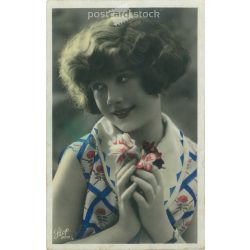   French, romantic postcard. Young woman in French fashion clothes. Colored photo sheet, postcard. (2792048)