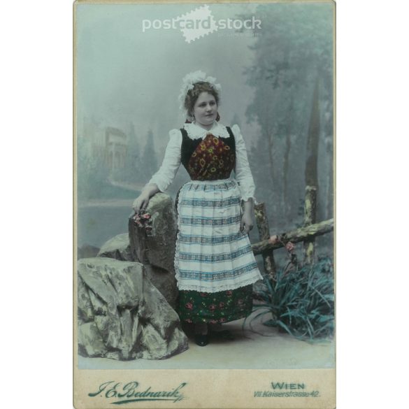 1902 - F.E. Bednarik photographic studio, Vienna. Full-length photo of a young woman in festive, folk attire. Colored  Cabinet card / CDV photo / hardback photo. (2792098)
