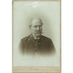   Late 1800s. Dunky brothers photography studio, Cluj. Studio portrait of an elderly man. In fancy, classy clothes.  Cabinet card / CDV photo / hardback photo. (2792115)