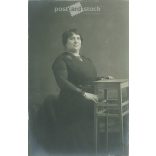 1910s. Full-figured studio shot of a middle-aged lady. Original paper image, gelatin silver. Its maker is unknown. (2792152)