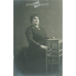   1910s. Full-figured studio shot of a middle-aged lady. Original paper image, gelatin silver. Its maker is unknown. (2792152)