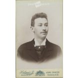 Early 1900s - Studio portrait of a young man. Produced by Péter Kalmár’s photography studio in Budapest.  Cabinet card / CDV photo / hardback photo. (2792174)