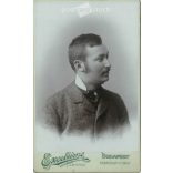 1899 - Studio portrait of a young man. Produced by Péter Kalmár’s photography studio in Budapest.  Cabinet card / CDV photo / hardback photo. (2792176)