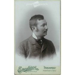   1899 - Studio portrait of a young man. Produced by Péter Kalmár’s photography studio in Budapest.  Cabinet card / CDV photo / hardback photo. (2792176)