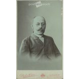 Early 1900s - Studio portrait of a middle-aged man. Produced by Ödön Békei’s photography studio in Budapest.  Cabinet card / CDV photo / hardback photo. (2792183)
