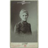 1907 - Studio portrait of a middle-aged woman. Produced by Ödön Békei’s photography studio in Budapest. Identity card. Published by Hungarian State Railways.  Cabinet card / CDV photo / hardback photo. (2792184)