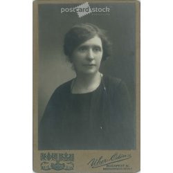   1922 - Studio portrait of a middle-aged woman. Produced by Ödön Uher’s photography studio in Budapest.  Cabinet card / CDV photo / hardback photo. (2792190)