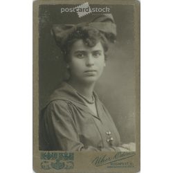   1920s - Studio portrait of a young woman. Produced by Ödön Uher’s photography studio in Budapest.  Cabinet card / CDV photo / hardback photo. (2792192)