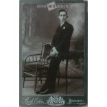 Early 1900s - Studio full-length photo of a young man. Produced by Ödön Beck’s photography studio in Budapest. Aunt Keréna’s son, who is in America.  Cabinet card / CDV photo / hardback photo. (2792196)