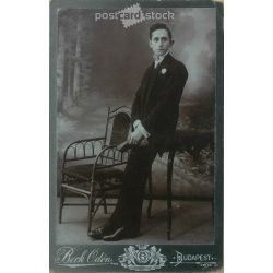   Early 1900s - Studio full-length photo of a young man. Produced by Ödön Beck’s photography studio in Budapest. Aunt Keréna’s son, who is in America.  Cabinet card / CDV photo / hardback photo. (2792196)