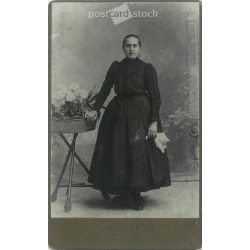   Early 1900s - Studio full-length photo of a young woman. It was made by Klomann N.’s photography studio in Esztergom.  Cabinet card / CDV photo / hardback photo. (2792197)