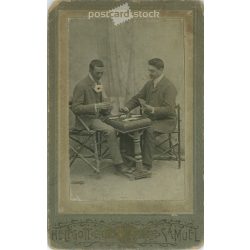  Early 1900s - Studio photo of men playing cards, full length. It was made by Helfgott’s photography studio in Városliget, Budapest.  Cabinet card / CDV photo / hardback photo. (2792201)