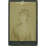1886 - Studio photo of an elegant young woman. Produced by W. Langmann, photographic studio, Klostergarden.  Cabinet card / CDV photo / hardback photo. (2792212)