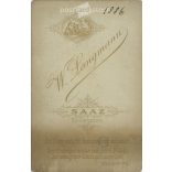 1886 - Studio photo of an elegant young woman. Produced by W. Langmann, photographic studio, Klostergarden.  Cabinet card / CDV photo / hardback photo. (2792212)