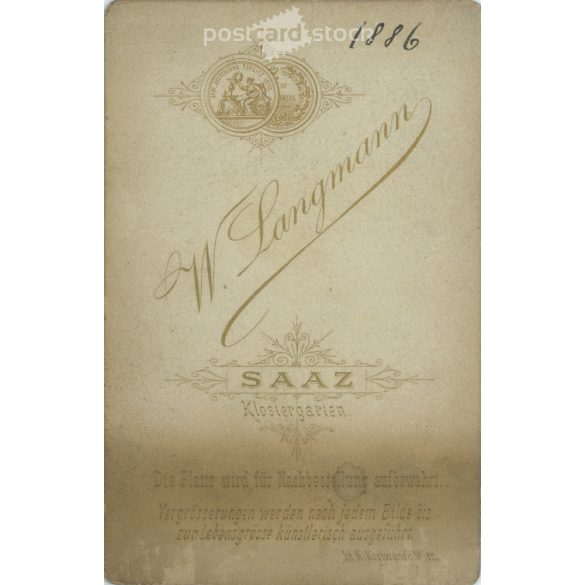 1886 - Studio photo of an elegant young woman. Produced by W. Langmann, photographic studio, Klostergarden.  Cabinet card / CDV photo / hardback photo. (2792212)