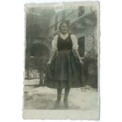   1930s. Unknown young girl in the courtyard. Winter shot. Original paper image. Its maker is unknown. (2792224)