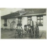 1927 - Bath, in the tub of the water barrel. Dad and the girls. Original paper image. Its maker is unknown. (2792226)