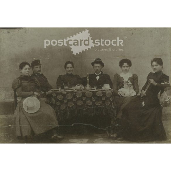 Early 1900s. young men and women sitting around a table. Wilhelm Herter photography studio, Schassburg (Segesvár). Original  Cabinet card / CDV photo / hardback photo. (2792246)