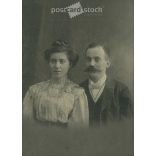1910s. Young couple in elegant clothes, studio shot. It was taken in Gyula Franciscy’s photography studio in Körmöcbány. Original, cashiered paper image. (2792251)