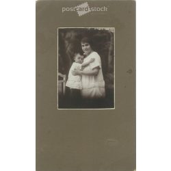   1910s. Mother with her child, studio shot. Made in the photographic studio of Homonnai, Makó. Original, cashiered paper image. (2792264)