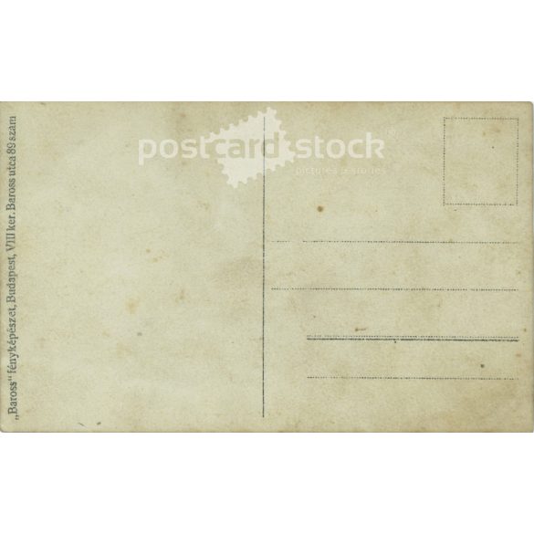 1940s. Full-length photo of an unknown young woman with a flower. Made in the Baross photography studio. Budapest, Baross street. Photo sheet, postcard. Original paper image, gelatin silver. (2792277)