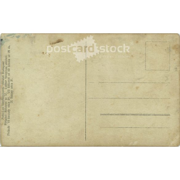 1930s. Full-length photo of an unknown young boy. It was made in the studio of Foto-lux photography company. Ráday Street, Budapest. Colored photo sheet, postcard. Original paper image. (2792278)