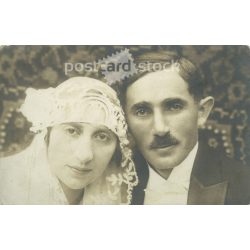   1910s. Young, unknown couple, wedding shot. Made by Erzsébet photo studio, Pécs, Király utca 15. Photo sheet, postcard. (2792288)