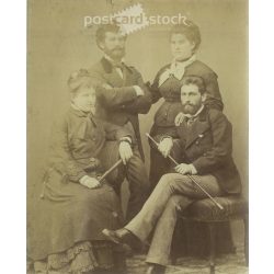  Studio group photo taken in the early 1900s. The creator of the image and the identity of the people in the image are unknown. Original paper image. (2792293)