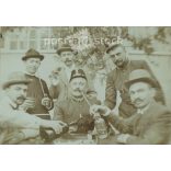 Early 1900s. Interesting table company. The person who took the photo and the people on it are unknown. Covered on hardboard. Cabinet photo / hardback photo / business card. (2792313)