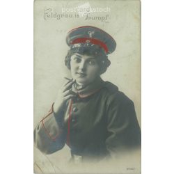   1915 - Young woman in uniform with a cigarette. Colored photo sheet, postcard. (2792341)